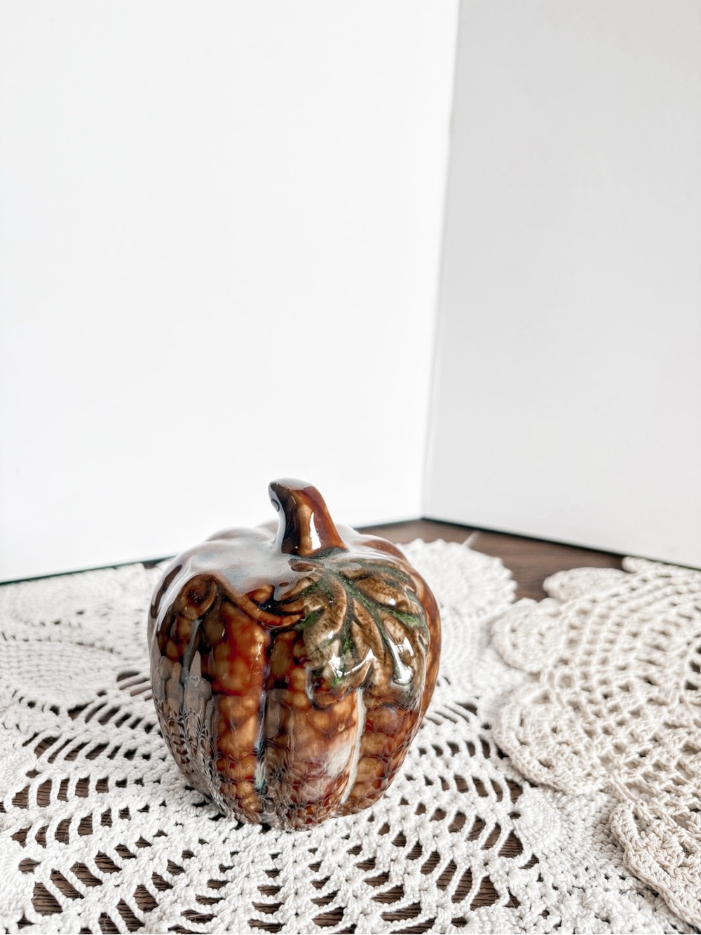Glazed Brown Ceramic Pumpkin Accent with Green Leaf Detail